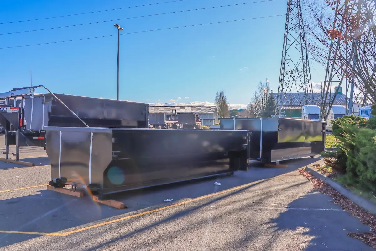Roll-off dumpster ready for waste disposal at job site for 12 Yard Dumpster Rental in Harlingen